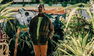 Ron Finley standing in his garden