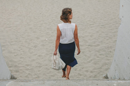 Modeling The Samantha, walking down onto the beach.