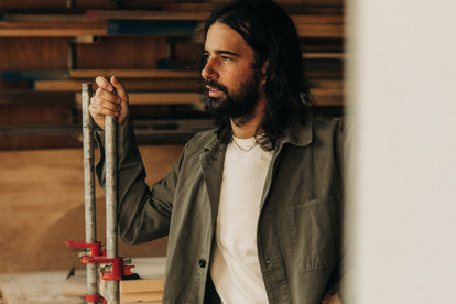 Nikolai Lafuge posing in his studio