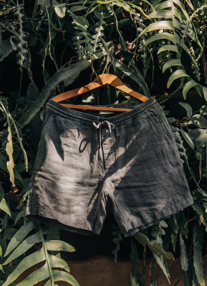 The Après Short in Granite Hemp on a hanger