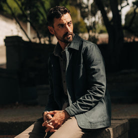 fit model sitting in The Ojai Jacket in Organic Navy Foundation Twill, Outerwear by Taylor Stitch