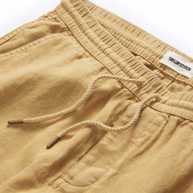 material shot of the drawcords on The Apres Short in Wheat Hemp, Bottoms by Taylor Stitch