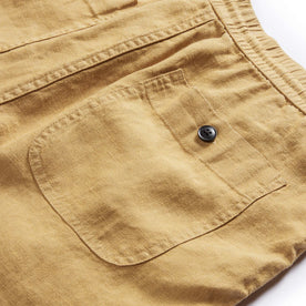 material shot of the rear pocket on The Apres Short in Wheat Hemp, Bottoms by Taylor Stitch