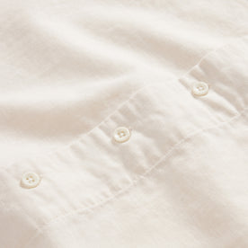 material shot of the buttons on The Short Sleeve Hawthorne in Birch, Wovens by Taylor Stitch