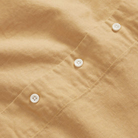 material shot of the buttons on The Short Sleeve Hawthorne in Wheat, Wovens by Taylor Stitch