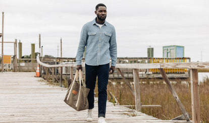 fit model walking wearing The Democratic Jean in Wallace Wash Organic Selvage