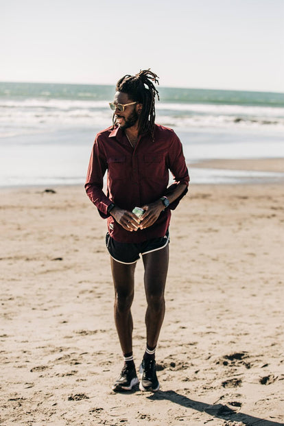 Our guy on the beach strolling towards camera.