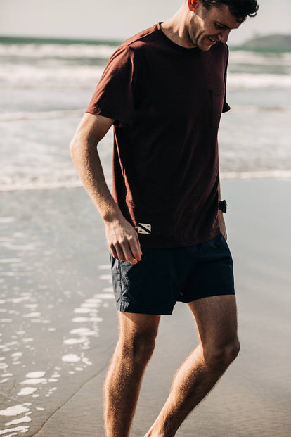 Our guy paddling in the shallows, smiling to himself.