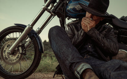 shot of ben leaning against bike.