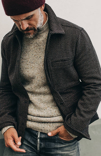 A man wearing the Decker Jacket in Wool Beach Cloth.