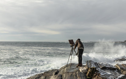 Tim wearing The Longshore Jacket in Dark Oak Waxed Canvas, The HBT Jacket in Washed Olive, and The Morse Pant in Charcoal on the maine coast.