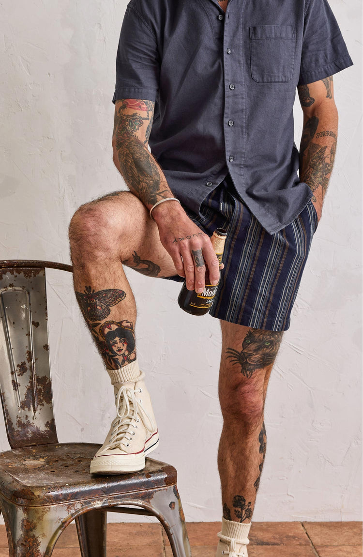 Our model wearing The Apres Short in Indigo Stripe