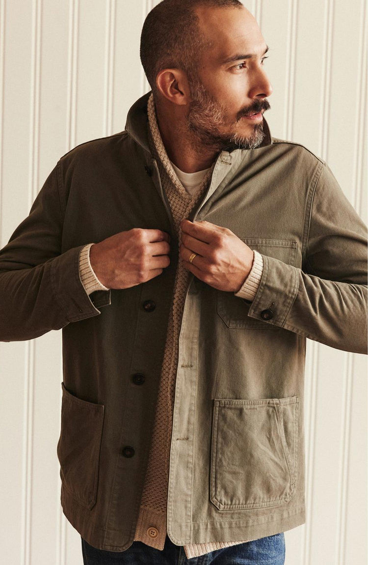 fit model buttoning up The Ojai Jacket in Organic Smoked Olive Foundation Twill