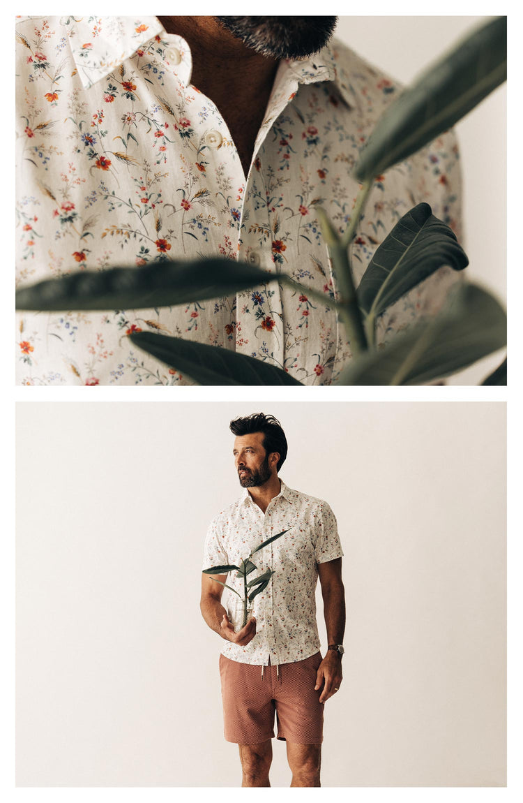 fit model posing with a plant in The Short Sleeve California in Vintage Botanical