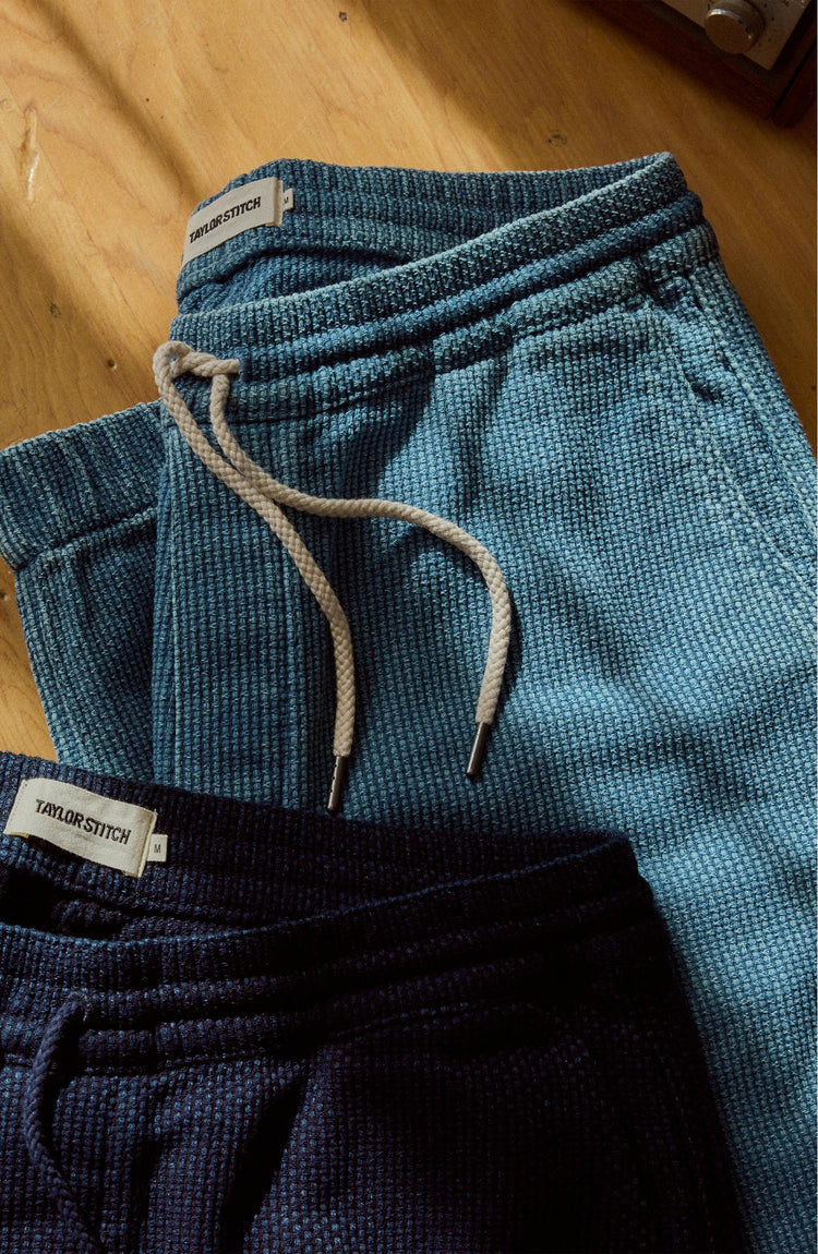 editorial flatlay of The Apres Pant in Washed Indigo Sashiko