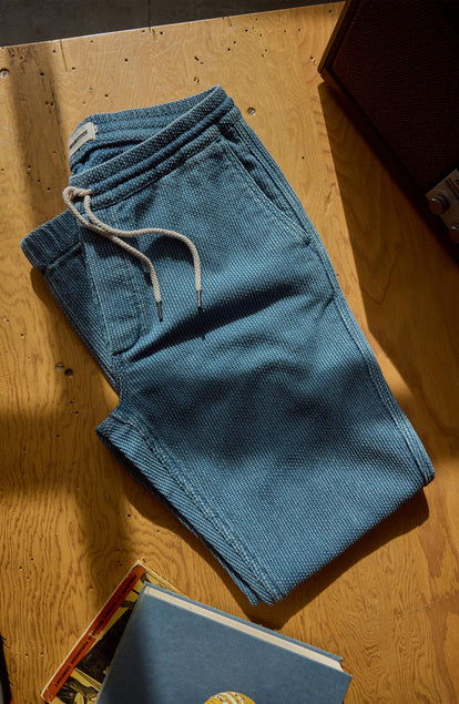 editorial image of The Apres Pant in Washed Indigo Sashiko on the ground