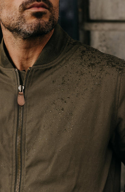 Close up of fit model in The Bomber Jacket in Fatigue Olive Dry Wax