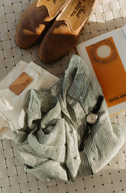 editorial flatlay of The Jack in Cilantro Stripe Linen