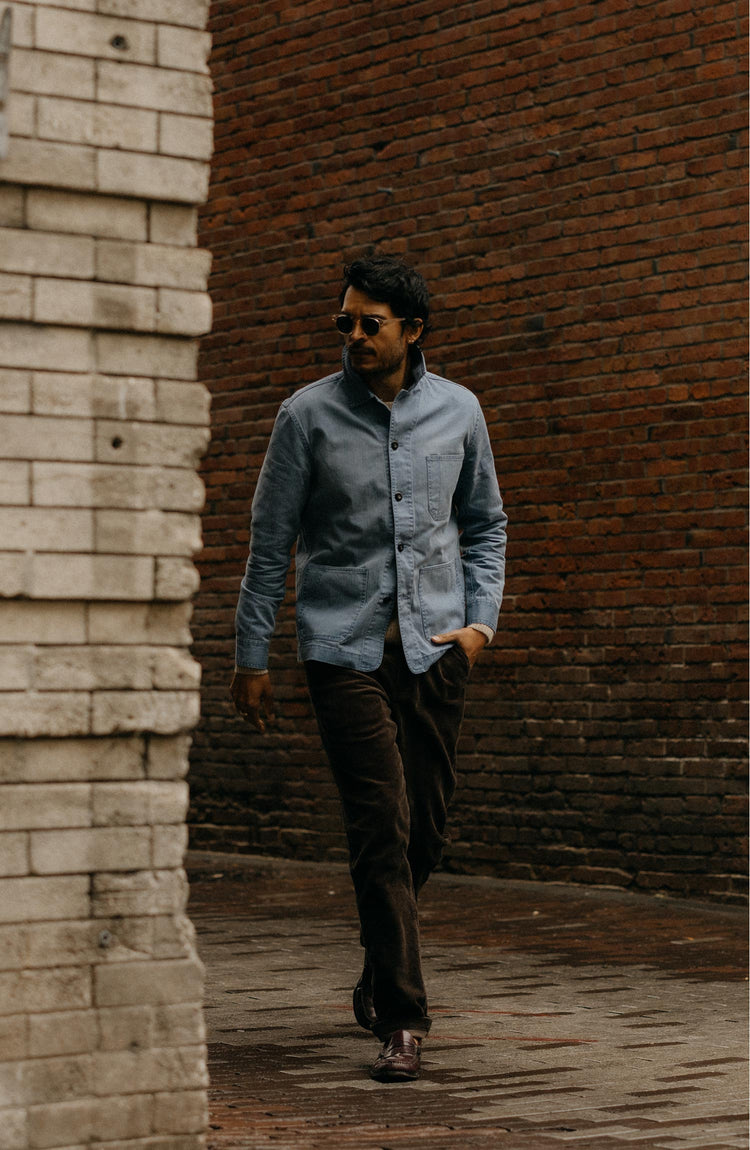 fit model walking wearing The Ojai Jacket in French Blue Herringbone