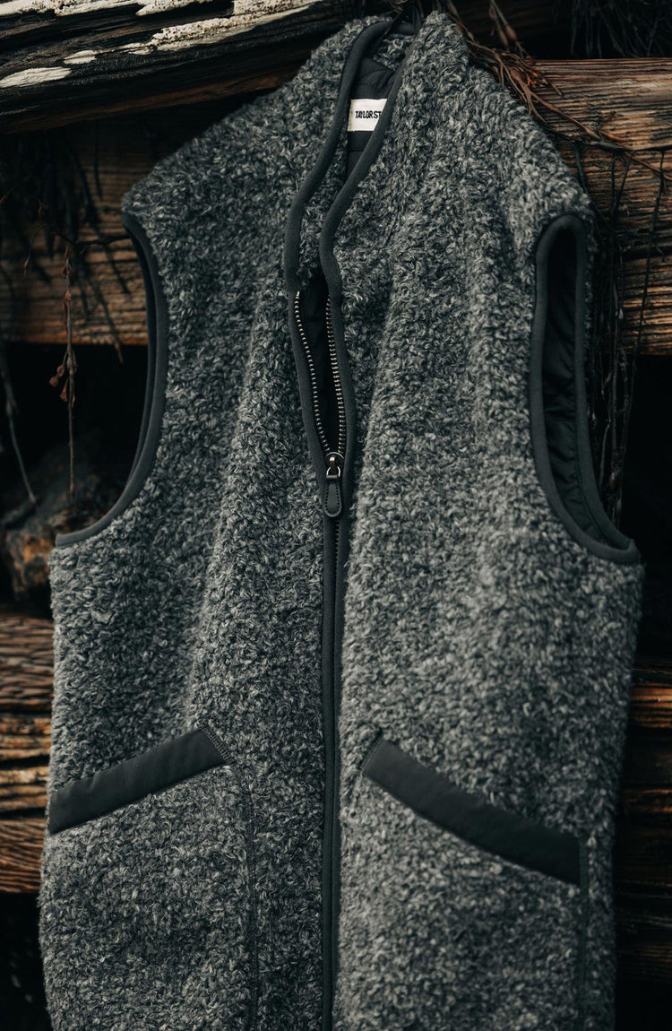 editorial image of The Port Vest in Coal Marl Boucle Fleece hanging