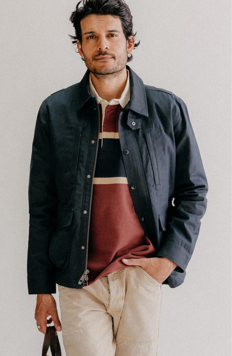 fit model with his hand in his pocket wearing The Rugby Shirt in Dried Cherry Stripe