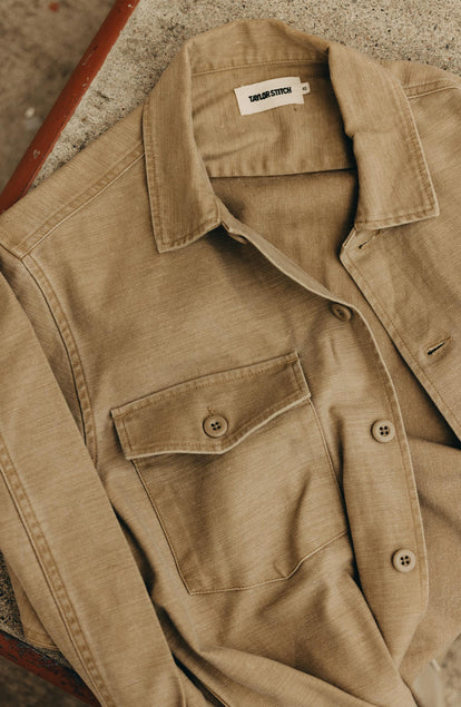 editorial image of The Surplus Shirt in Khaki Reverse Sateen on a rug