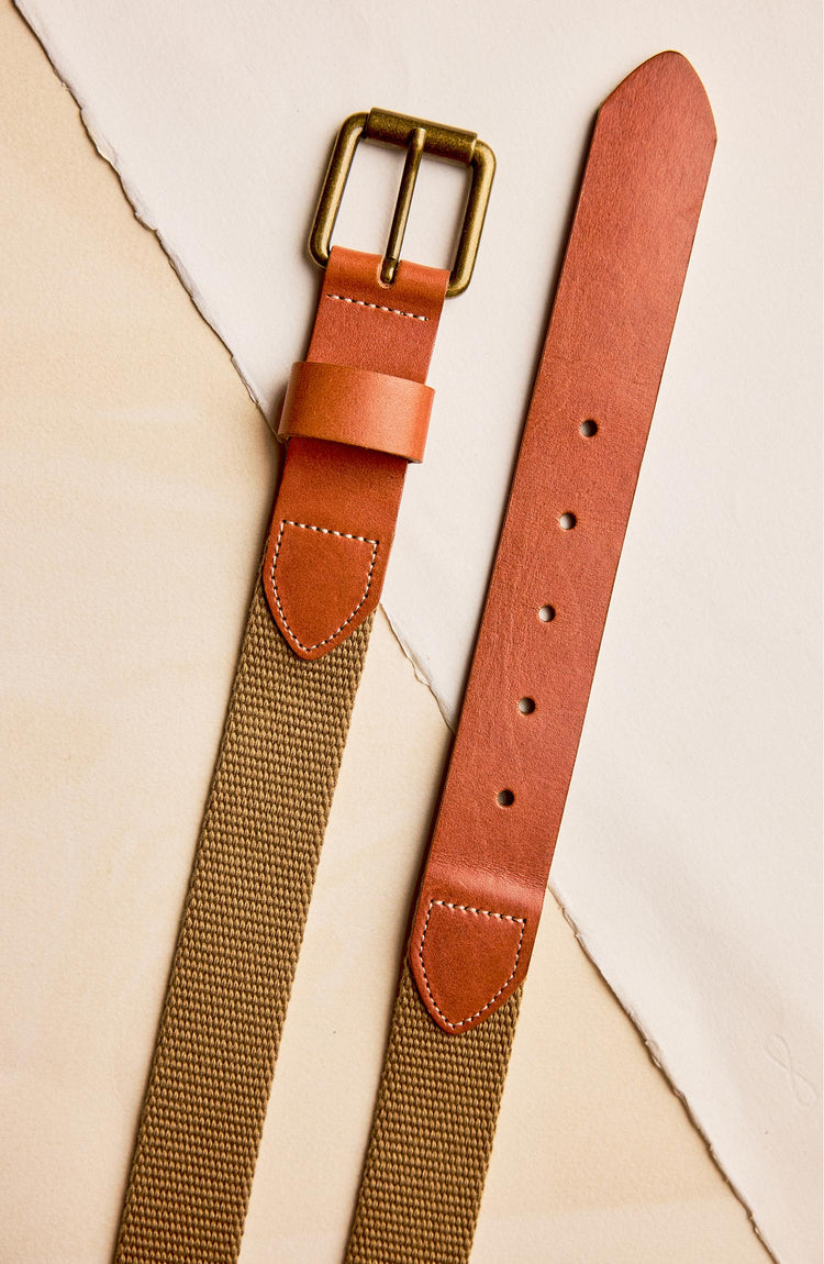 editorial flatlay of the buckle and end on The Webbed Belt in Whiskey