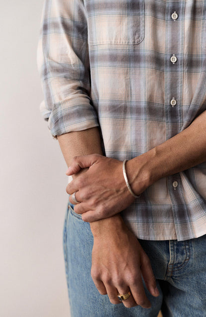 fit model showing off the cuffs on The Craftsman Shirt in Sky Shadow Plaid