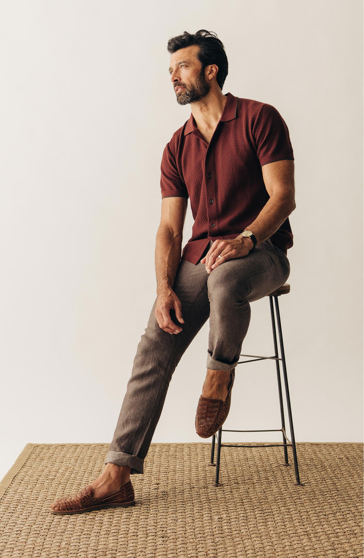 fit model sitting on a stool wearing The Easy Pant in Cocoa Linen