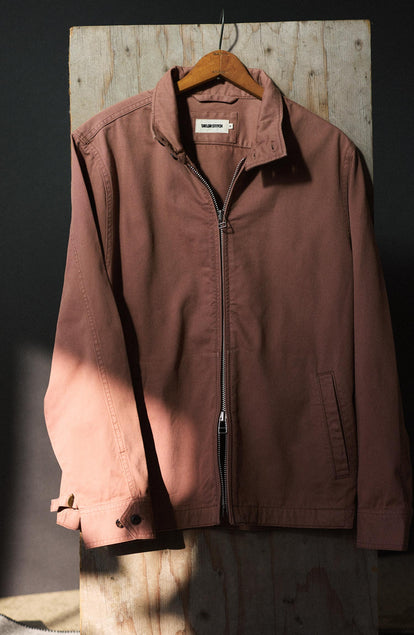 editorial image of The Flint Jacket in Faded Brick Broken Twill on a hanger