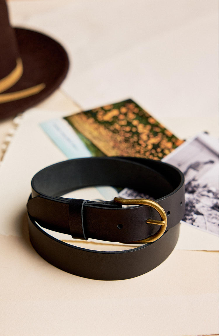 editorial image of The Foundation Belt in Black on a stack of paper