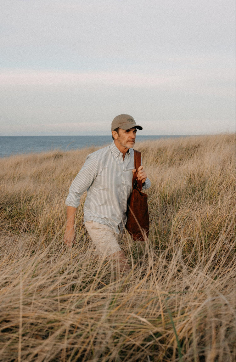 Our model wearing The Jack Oxford Shirt in Blue Stripe