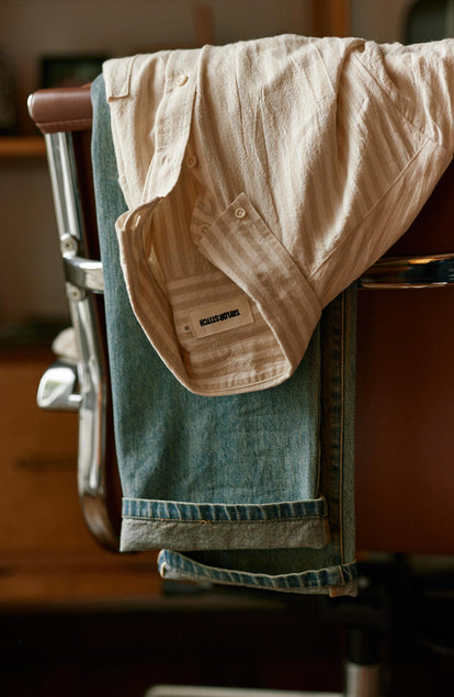 editorial image of The Jack in Dried Cacti Stripe hanging on a chair