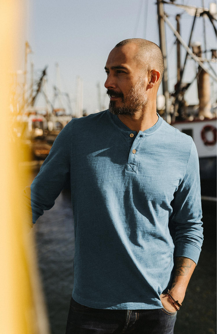 Model wearing The Organic Cotton Henley Shirt in Washed Indigo