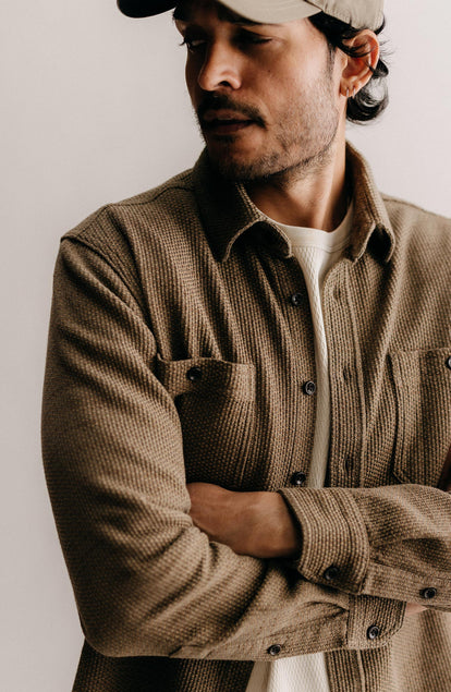 fit model with his arms crossed wearing The Utility Shirt in Cypress Sashiko