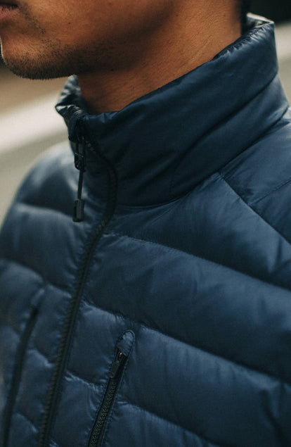 our model wearing the jacket with his bike—two images