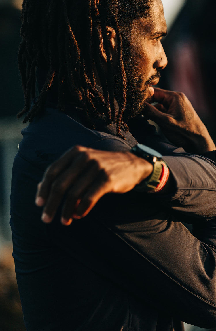 Our guy rocking The Tracksmith Collection bomber with text overlaying