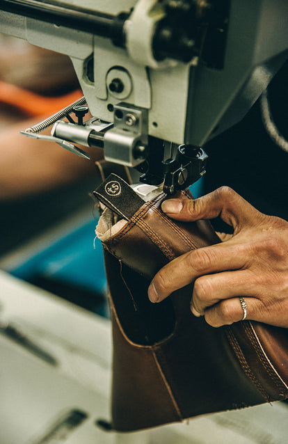 Templates cut out components of a boot sole.