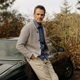 fit model leaning against a car in The Crawford Sweater in Ash Twist, Knits by Taylor Stitch