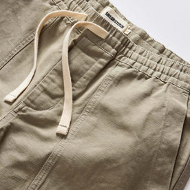 material shot of the waistband on The Apres Trail Short in Light Sage Slub, Bottoms by Taylor Stitch