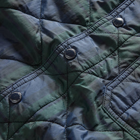 material shot of the snap buttons on The Ojai Jacket in Blackwatch Plaid Diamond Quilt, Outerwear by Taylor Stitch