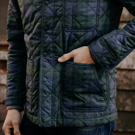 fit model with his hand in the front pockets of The Ojai Jacket in Blackwatch Plaid Diamond Quilt, Outerwear by Taylor Stitch