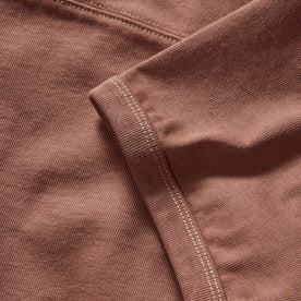 material shot of the ribbed sleeves on The Rugby Tee in Faded Brick, Knits by Taylor Stitch