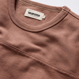 material shot of the neck opening and front yoke on The Rugby Tee in Faded Brick, Knits by Taylor Stitch