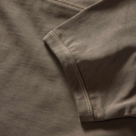 material shot of the ribbed sleeves on The Rugby Tee in Smoked Olive, Knits by Taylor Stitch