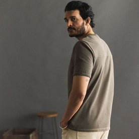 fit model showing the back of The Rugby Tee in Smoked Olive, Knits by Taylor Stitch