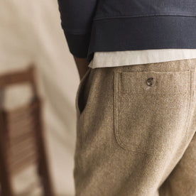 fit model showing the back button pockets on The Apres Pant in Oat Linen Tweed, Bottoms by Taylor Stitch