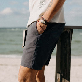 fit model with his hand in the pocket of The Apres Short in Organic Dark Blue Foundation Twill, Bottoms by Taylor Stitch