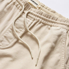 material shot of the waistband on The Apres Short in Organic Aged Stone Foundation Twill, Bottoms by Taylor Stitch