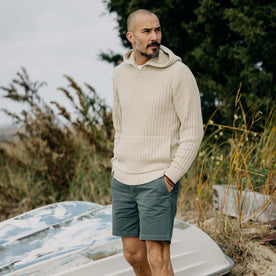 fit model walking wearing The Bryan Pullover Sweater in Flax Melange, Knits by Taylor Stitch